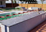 design an outdoor living space with kitchen, BBQ and pergola